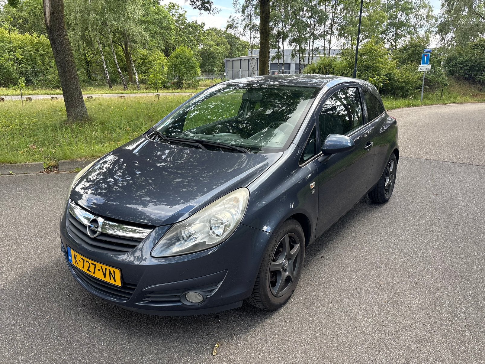 Foto 3 van Opel Corsa 1.2 Ecoflex 51KW 3D 2010 Grijs