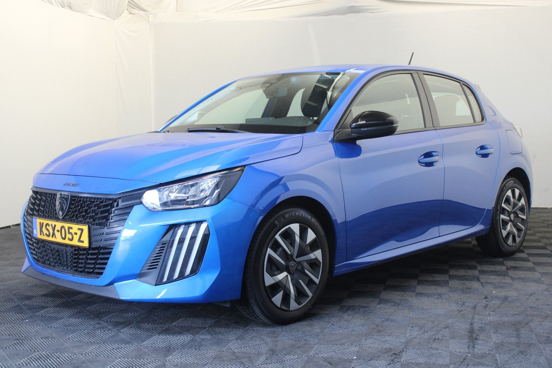 Peugeot 208 1.2 PureTech 75 Active (bj 2024), Auto's, Voorwielaandrijving, Stof, Gebruikt, Blauw