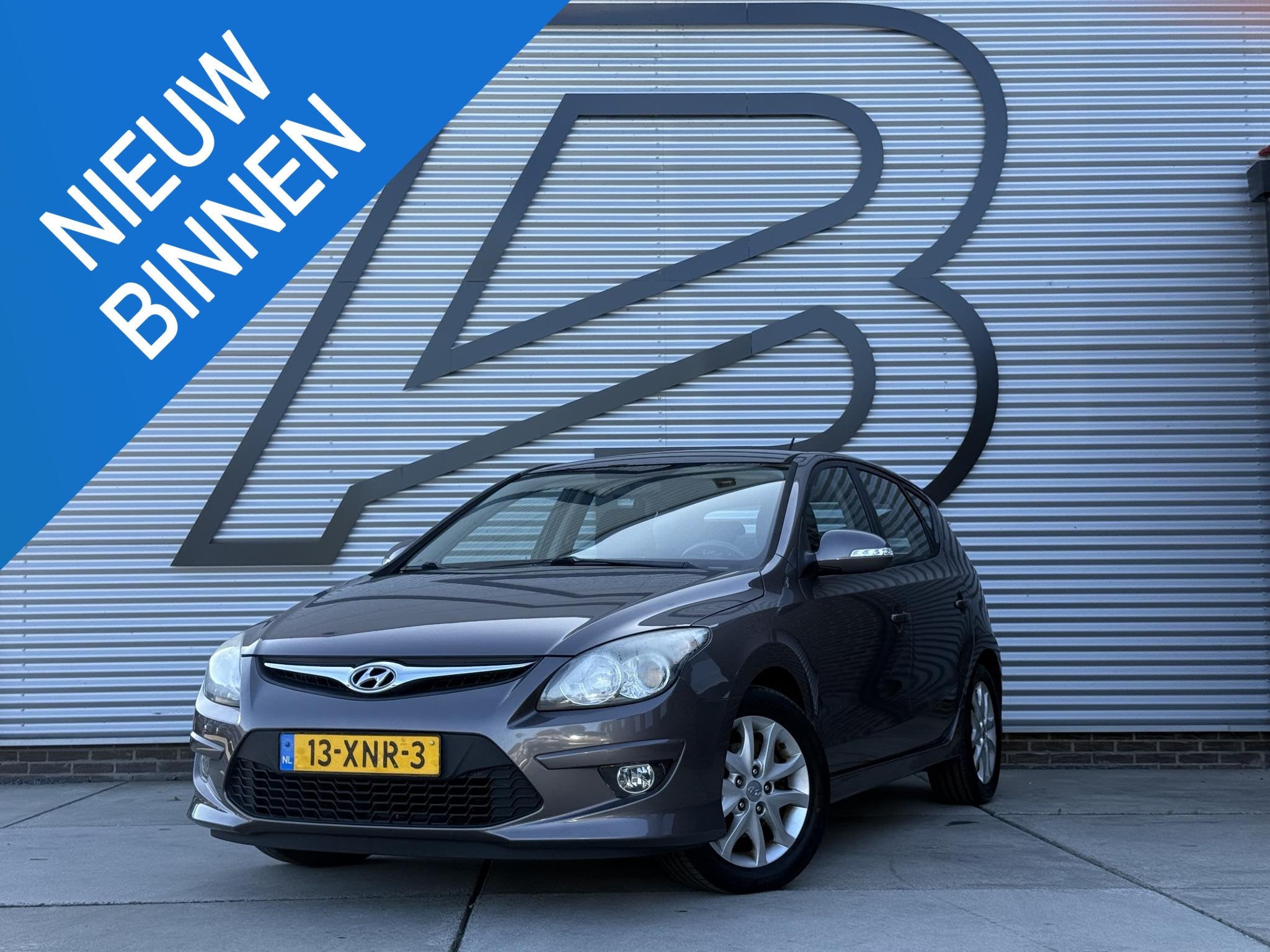 Hyundai i30 1.4i i-Motion 2e Eigenaar|Clima|Cruise|PDC|N.A.P, Auto's, Voorwielaandrijving, Euro 5, Stof, Gebruikt