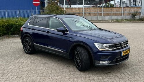 Volkswagen Tiguan 1.4 TSI 110KW/150PK 6DSG M16 2016 Blauw, Auto's, 1800 kg, Zwart, 4 cilinders, Blauw