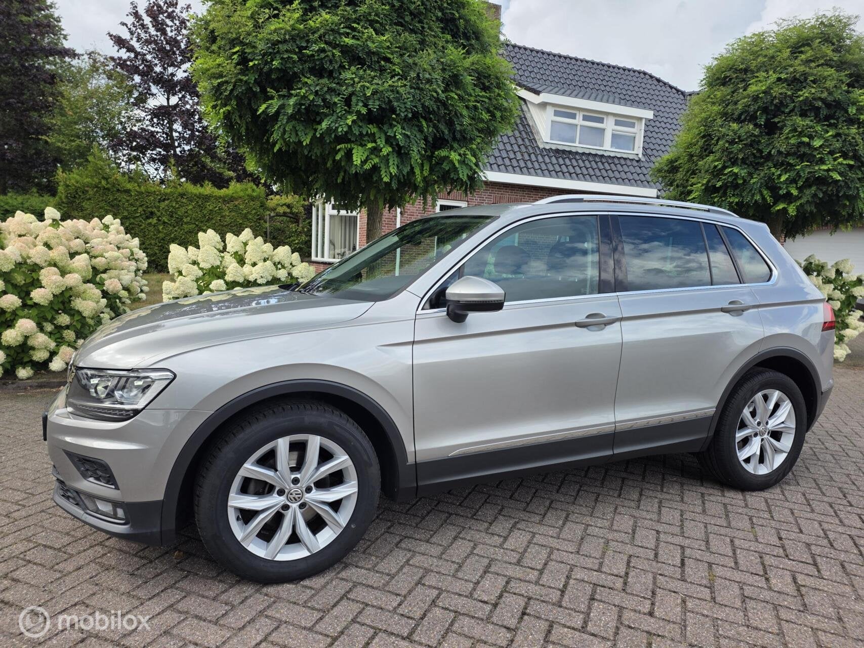 Volkswagen Tiguan 1.4 TSI Highline/pano dak/carplay/nav, Voorwielaandrijving, Gebruikt, 4 cilinders, Automatische klimaatregeling