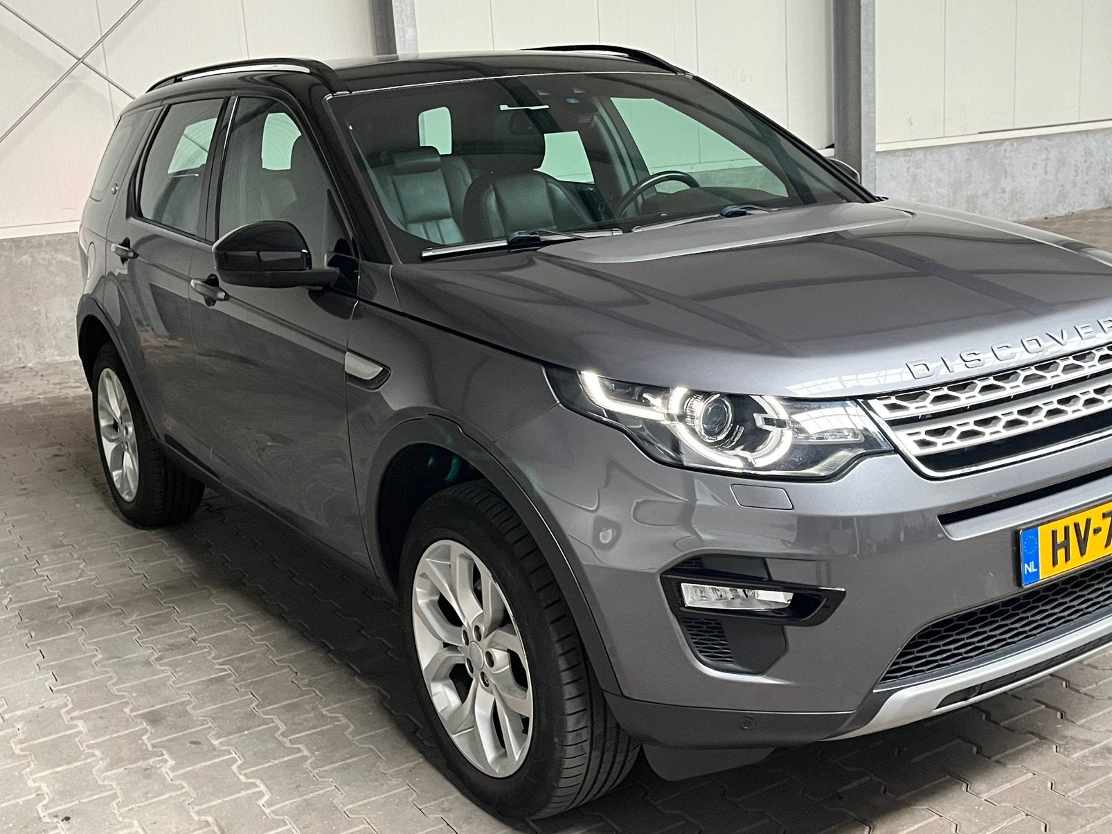 Land Rover Discovery Sport 2.0 TD4 4WD Aut9 2016 Grijs, Auto's, Automaat, 4 cilinders, 179 pk, Diesel