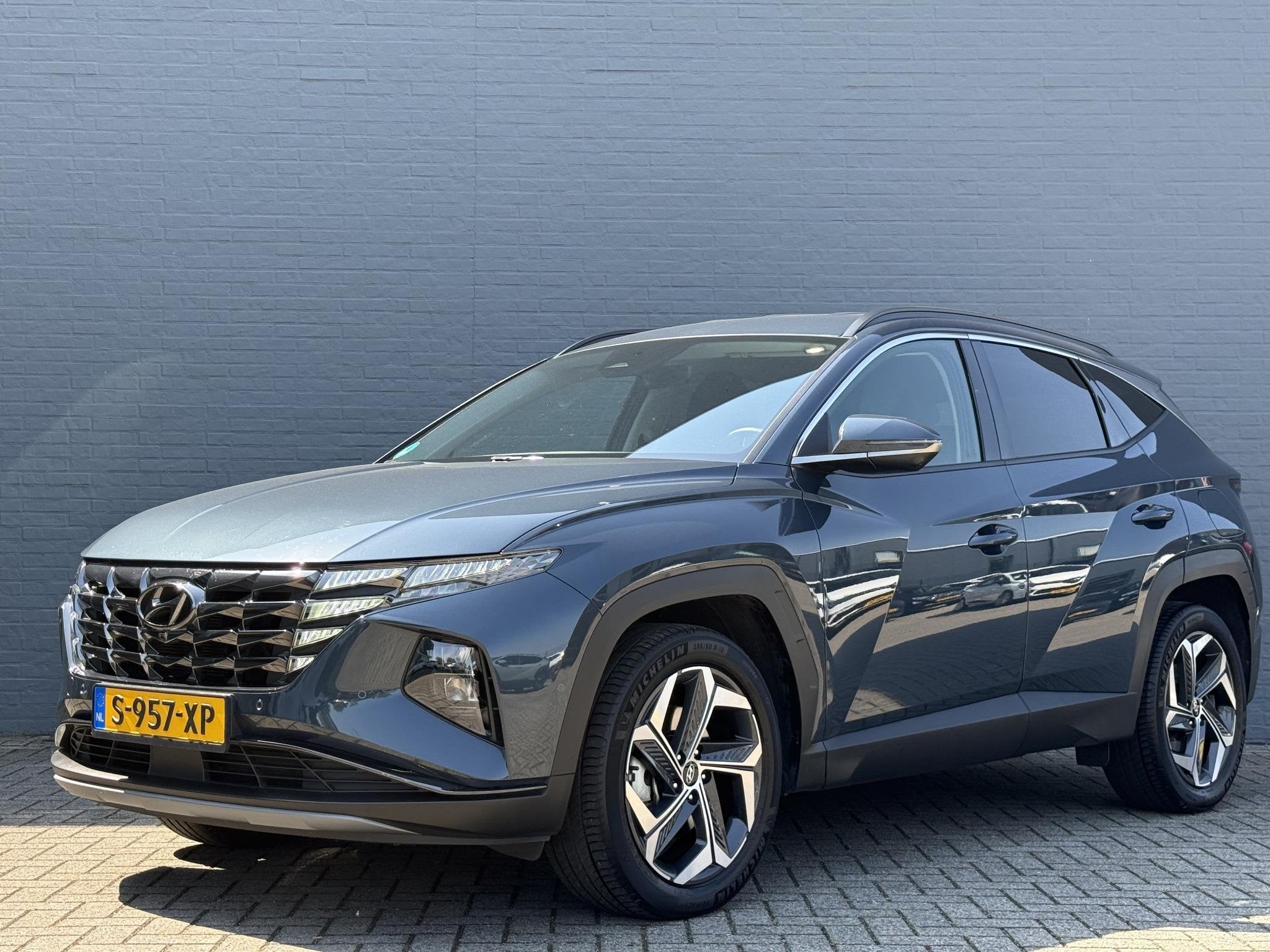 Hyundai Tucson 1.6 T-GDI HEV Premium, Auto's, Euro 6, 4 cilinders, Blauw, 1650 kg