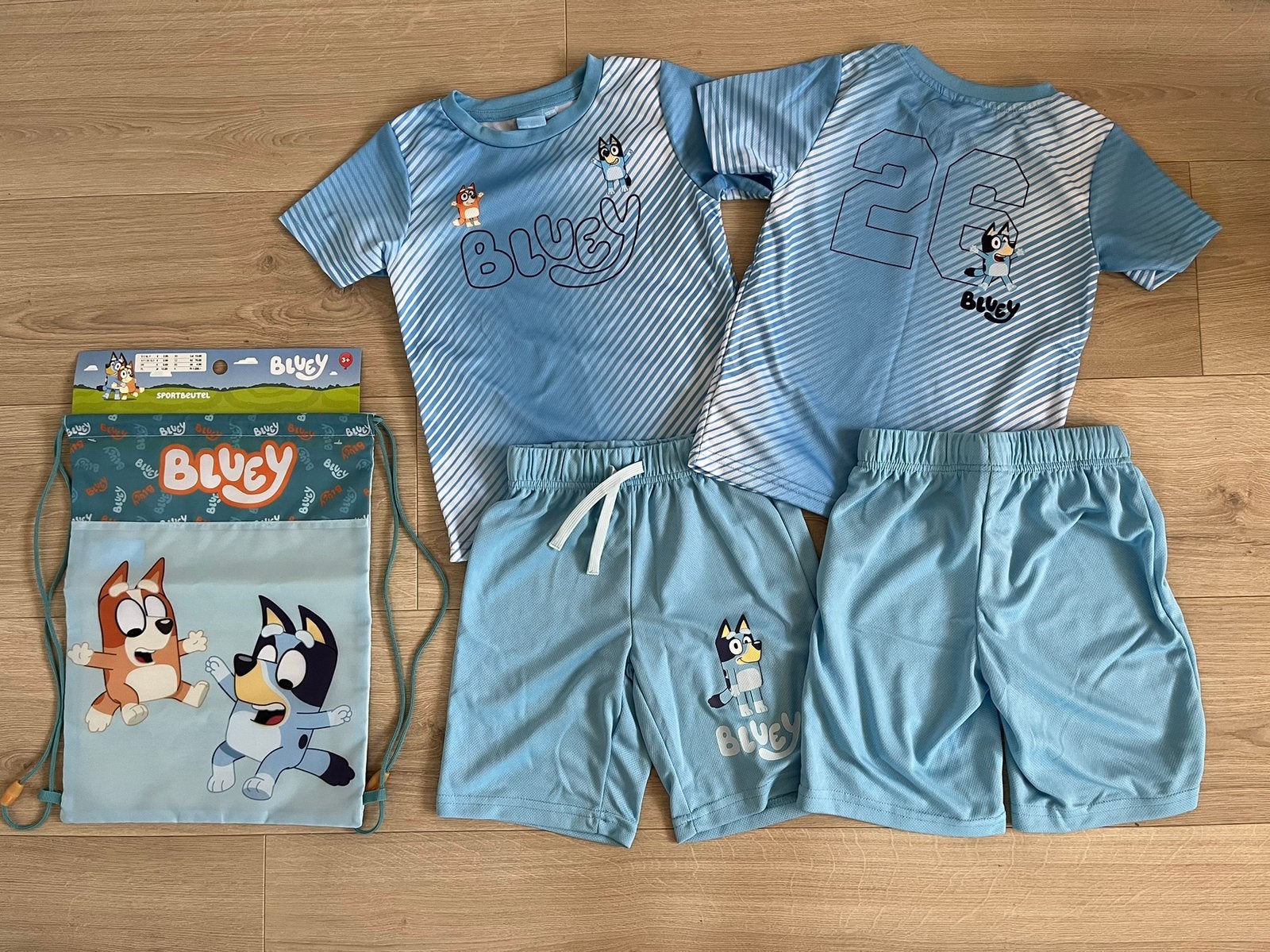 Sportset Bluey 122-128, Ophalen of Verzenden, Nieuw, Meisje