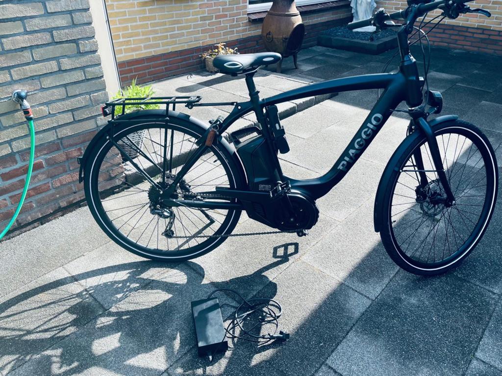 Piaggio  elektrische heren fiets, Fietsen en Brommers, Elektrische fietsen, Zo goed als nieuw, 50 km per accu of meer, 55 tot 59 cm