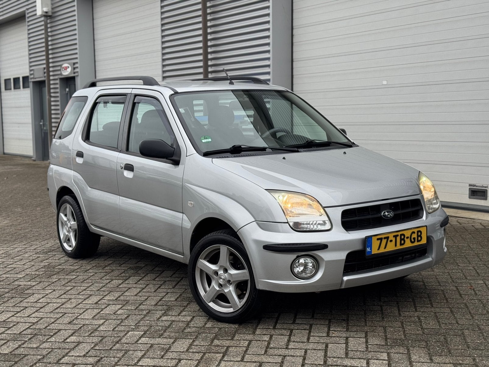 Subaru Justy 1.3 G3X AWD 2006 Grijs Airco Elek ramen NAP, Auto's, Subaru, Justy, Bedrijf, Handgeschakeld, Metallic lak