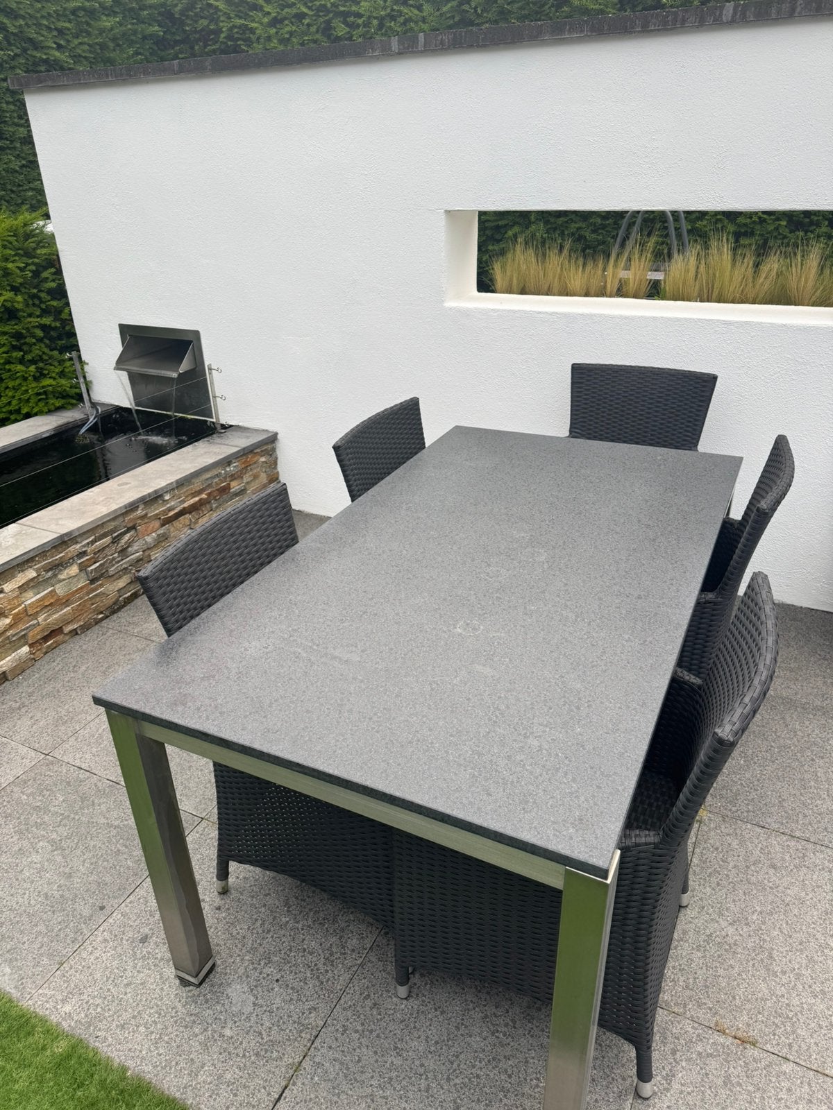 RVS tuintafel Natuurstenen blad 160 x 90 cm 5 wicker stoelen, Ophalen, Gebruikt, 6 zitplaatsen, Rvs