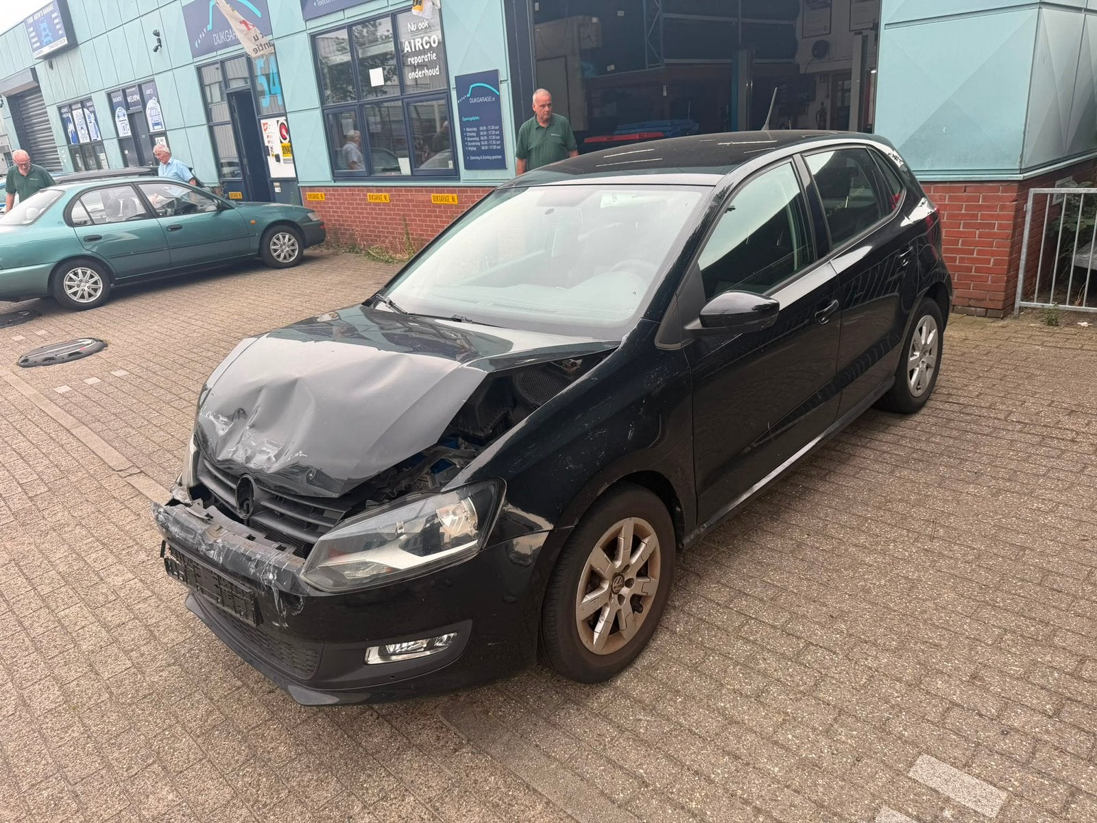 Volkswagen Polo 1.2-6V 2012 Zwart 5DRS AIRCO HANDBAK, Auto's, Voorwielaandrijving, 40 €/maand, Zwart, 1198 cc