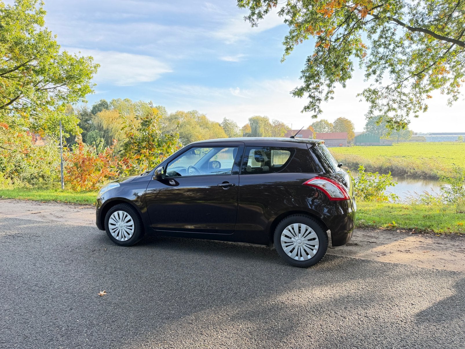 Suzuki Swift 1.2 3D 2015 Bruin, Auto's, Voorwielaandrijving, 4 cilinders, Bruin, Alcantara