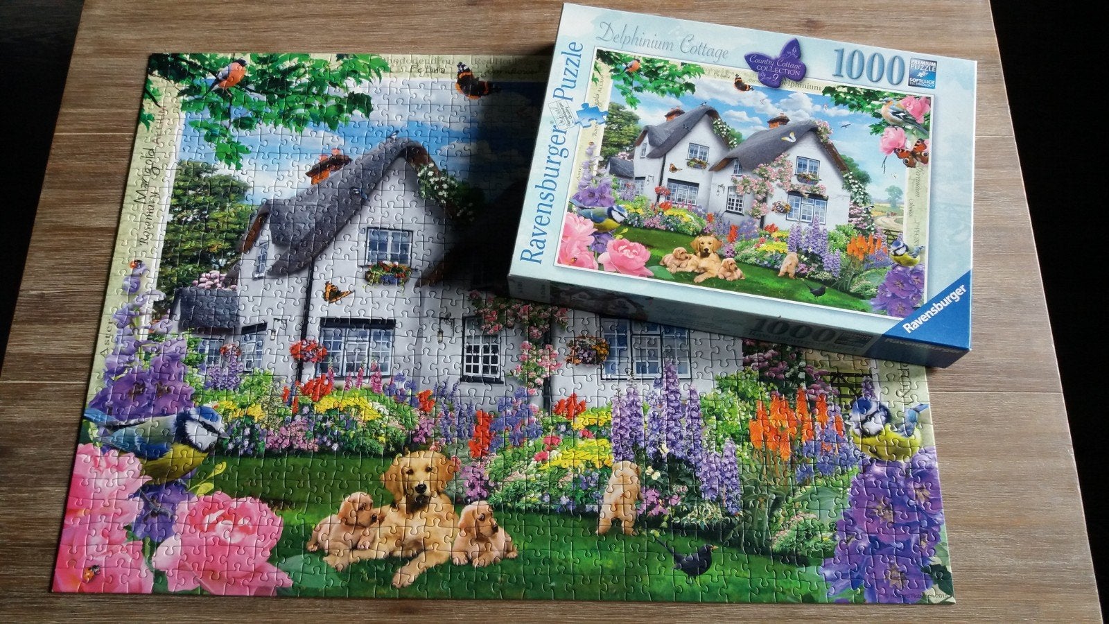 Ravensburger puzzel  1000 stukjes   Delphinium Cottage

Op t, Ophalen, 500 t/m 1500 stukjes, Zo goed als nieuw