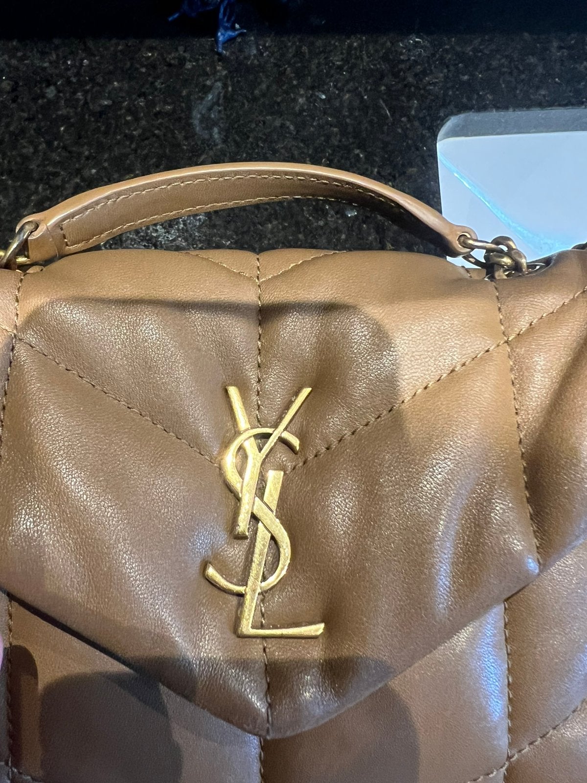 Orginele ysl puffer toy dark cork., Ophalen, Zo goed als nieuw, Zwart