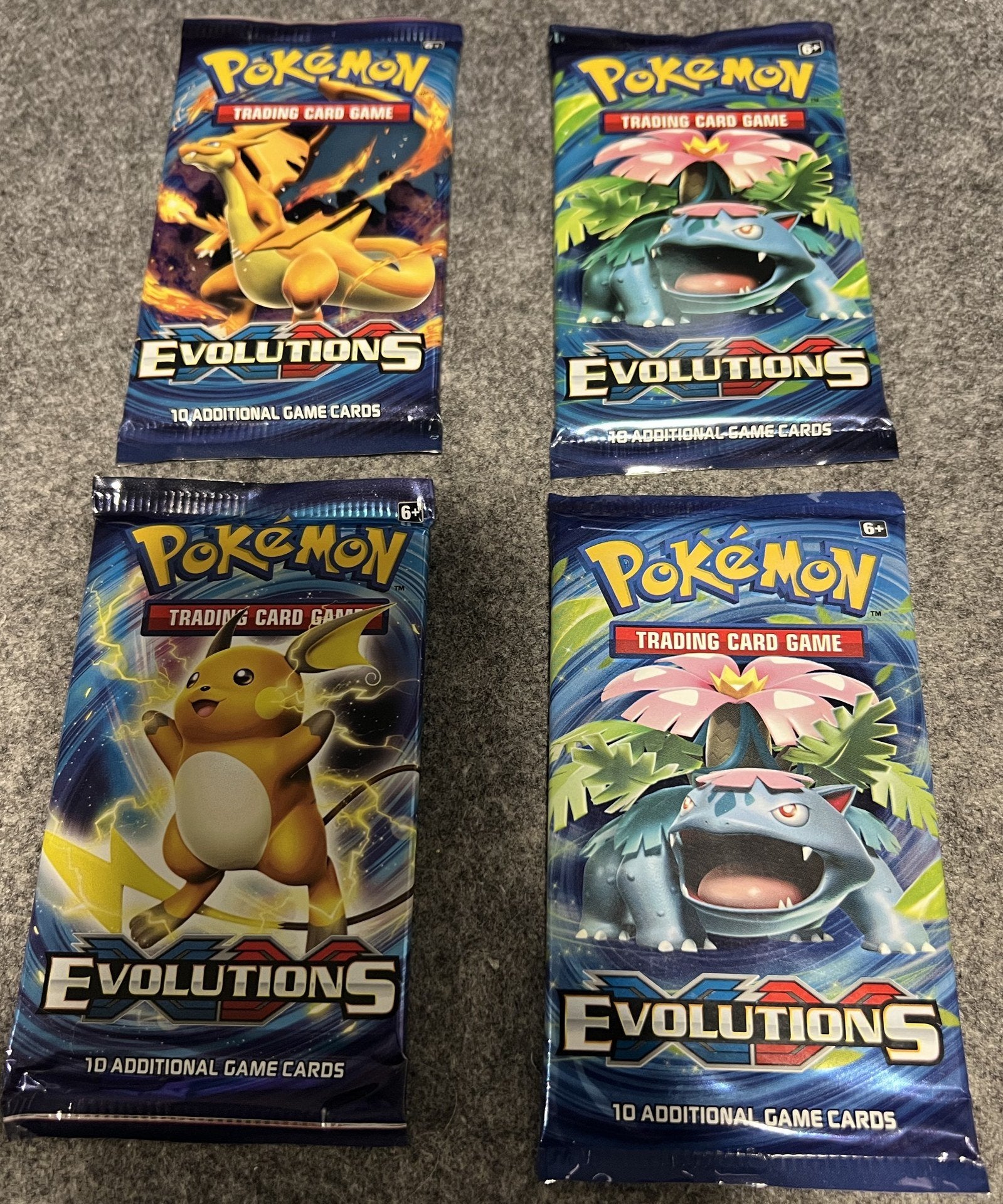 Pokémon TCG XY Evolutions — losse sealed booster, Hobby en Vrije tijd, Verzamelkaartspellen | Pokémon, Ophalen of Verzenden, Nieuw