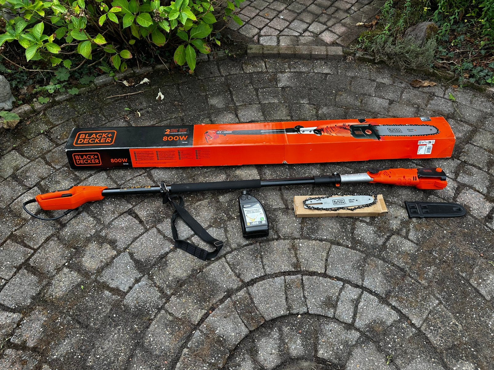 Kettingzaag op telescopische steel.