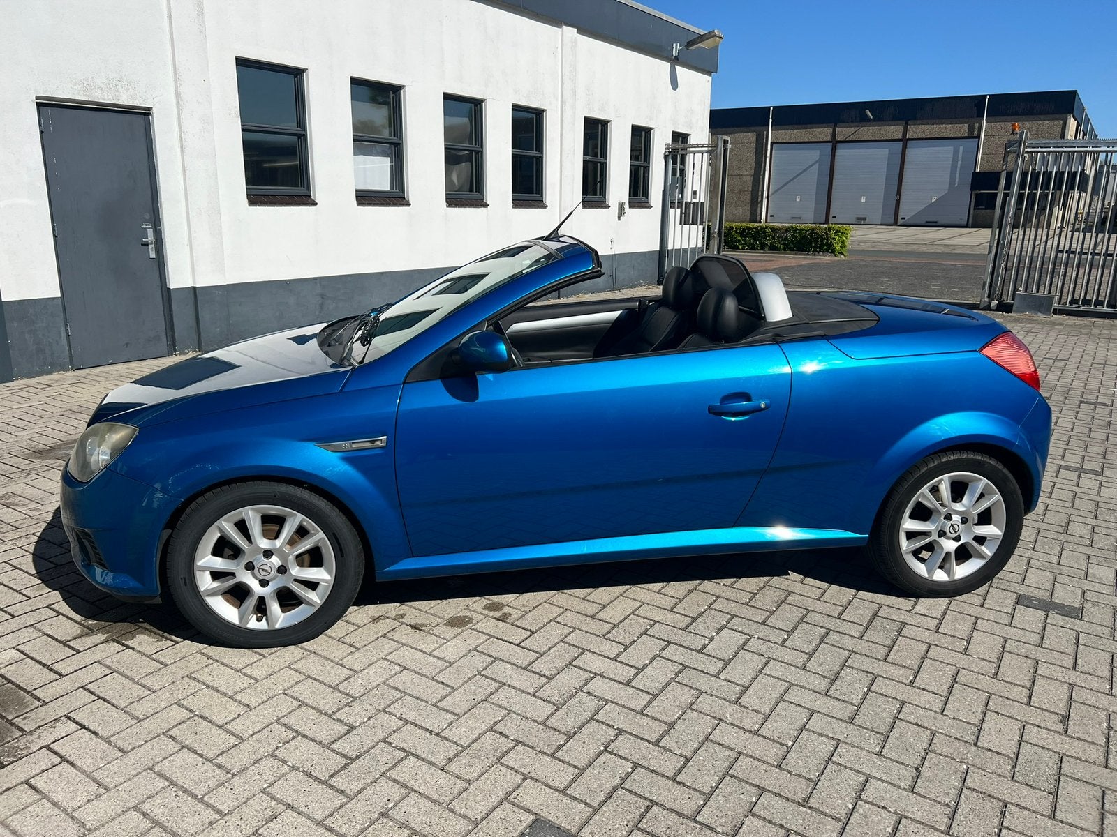 Opel Tigra 1.4 16V Twintop 2006 Blauw, Auto's, Voorwielaandrijving, 4 cilinders, Cabriolet, Blauw