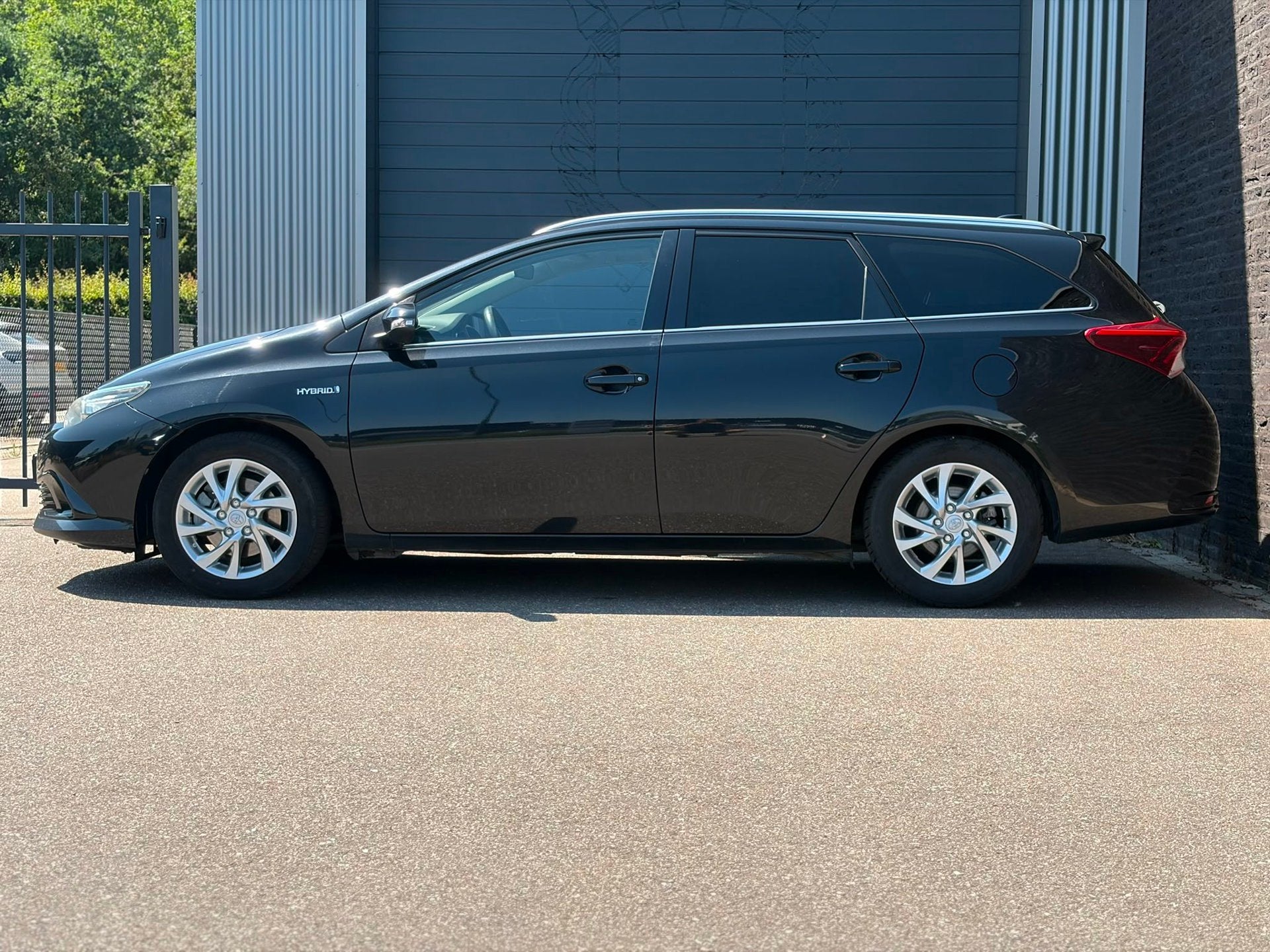 Toyota Auris Touring Sports 1.8 Hybrid Lease Automaat|Camera, Stof, Gebruikt, Euro 6, Zwart