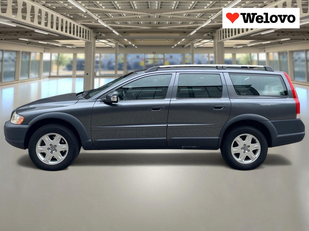 Volvo XC70 2.5 T Momentum dealer onderhouden, leder interieu, Automaat, Stoelverwarming, Zwart, XC70