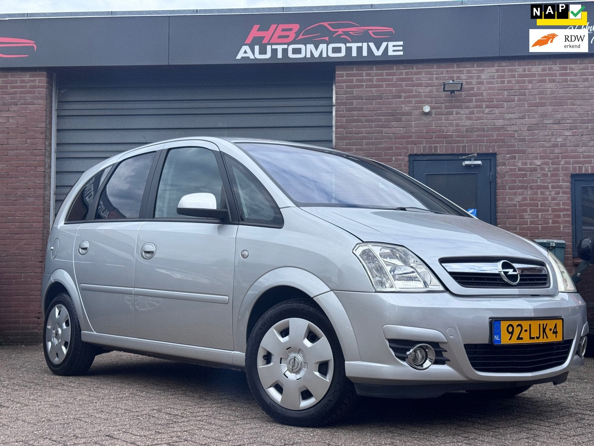 Opel Meriva 1.6-16V Cosmo AUTOMAAT/NIEUW DISTRI/AIRCO/2 EIG., Auto's, 15 km/l, Gebruikt, 4 cilinders, Leder en Stof