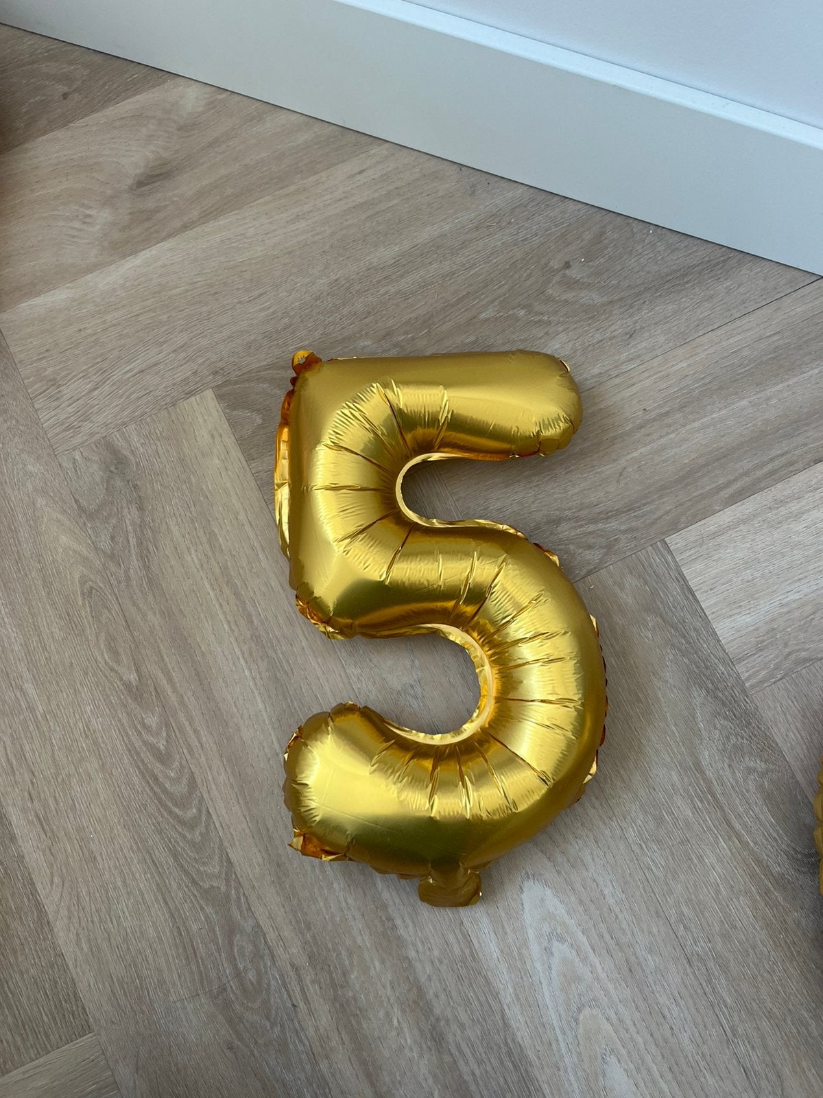 Gouden cijferballon 5, Ophalen, Gebruikt