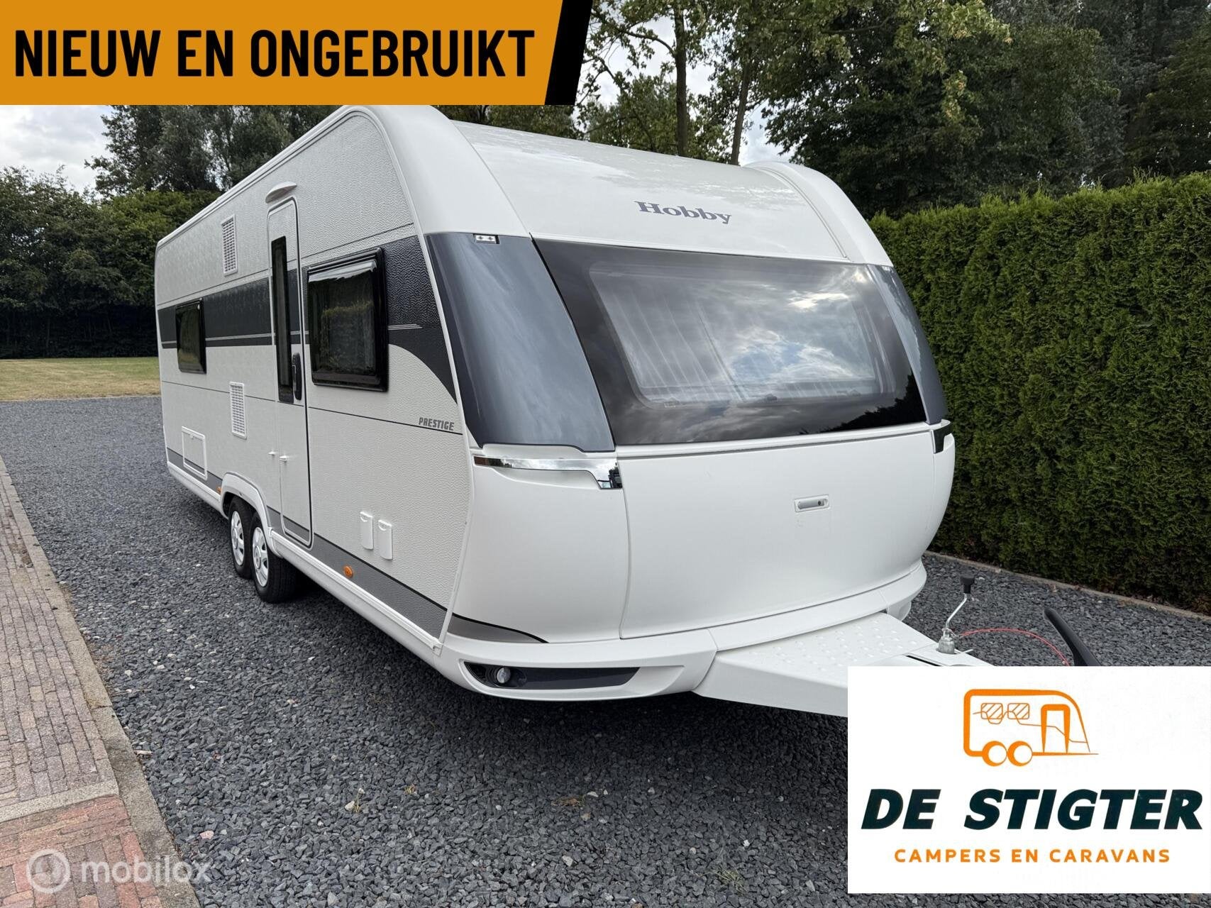 Hobby 660 WFC Prestige Badkamer Fransbed Rondzit NIEUW, Caravans en Kamperen, Hobby, Bedrijf, Ringverwarming, 8 meter en meer