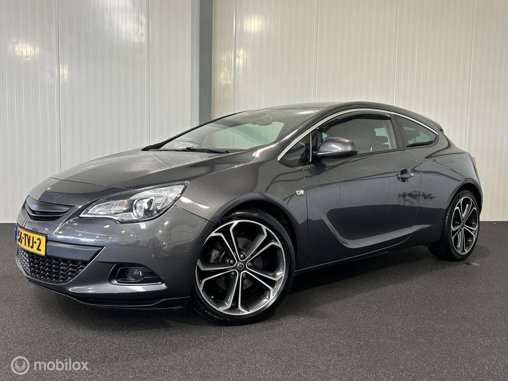 Opel Astra GTC 1.4 Turbo Sport [ NAP trekhaak cruise climate, Voorwielaandrijving, 4 cilinders, 700 kg, 1337 kg
