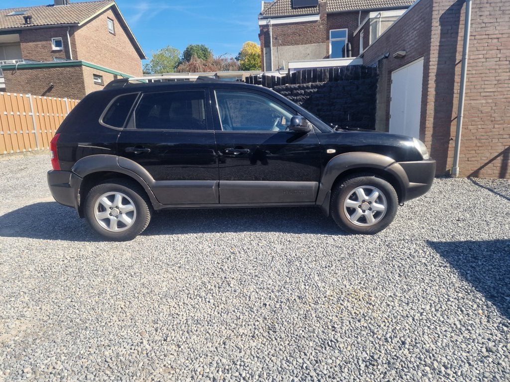 Hyundai Tucson 2.0i Dynamic, Auto's, Gebruikt, 4 cilinders, Zwart, Origineel Nederlands