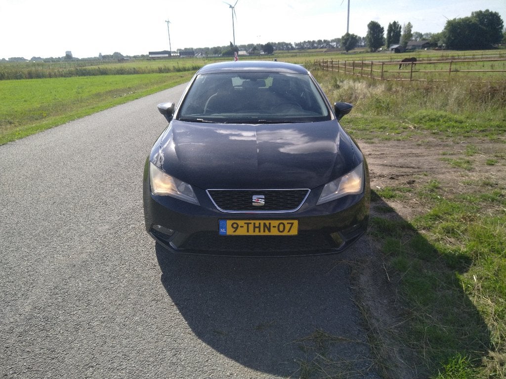 Seat Leon 1.2 TSI 77KW/105PK 2013 Zwart, Auto's, Voorwielaandrijving, Stof, Zwart, 4 cilinders
