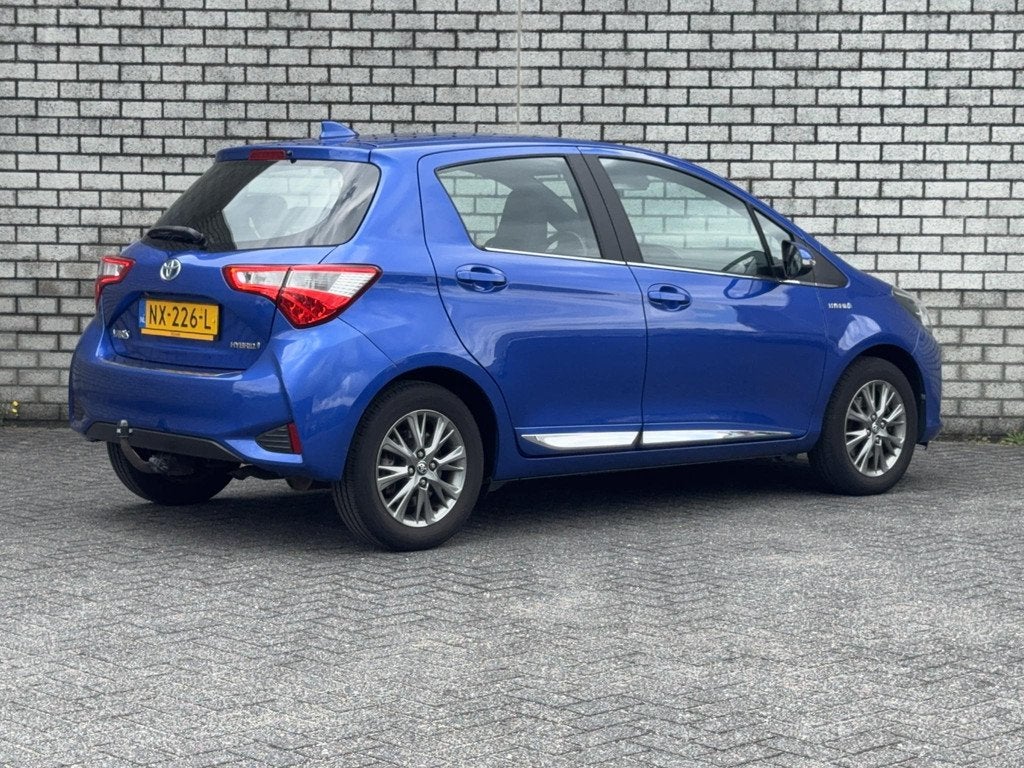 Toyota Yaris 1.5 Hybrid Executive | Trekhaak | Navigatie | A, Auto's, Toyota, Gebruikt, 4 cilinders, Met garantie (alle), 49 €/maand
