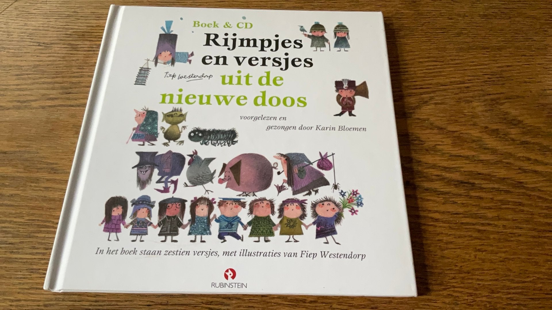 Rijmpjes en versjes uit de nieuwe doos - Boek & CD, Boeken, Ophalen of Verzenden, Zo goed als nieuw, 2 tot 3 jaar