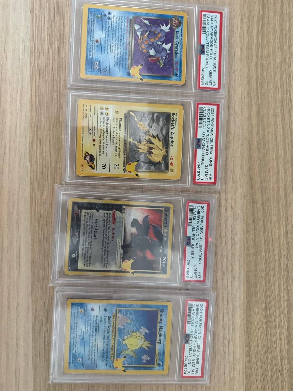 PSA 10 Celebrations Slabs: Umbreon, Zapdos, Gyarados, Magika, Ophalen of Verzenden, Nieuw