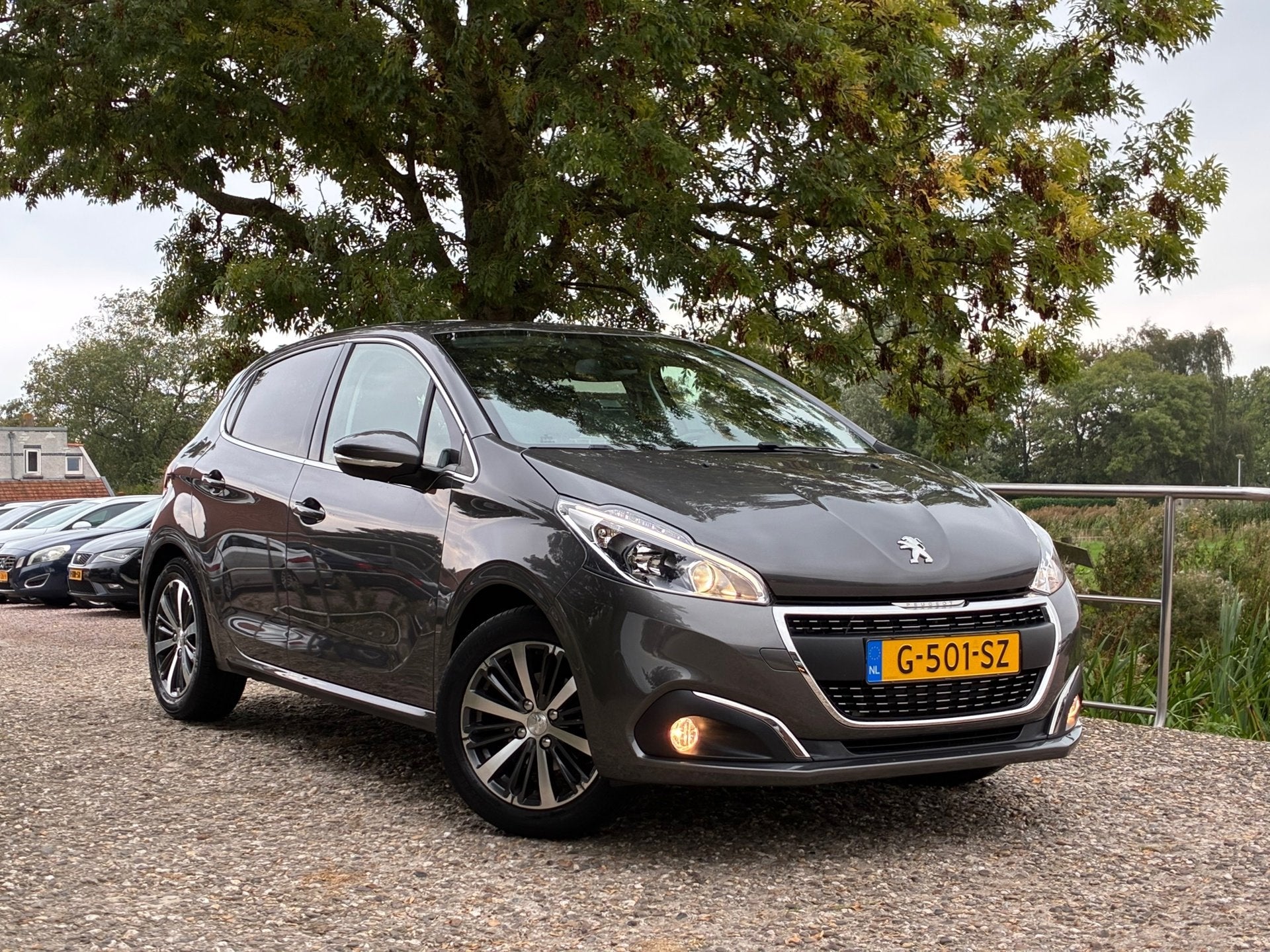 Peugeot 208 1.2 PureTech Allure | ''41.000 KM '' + Camera +, Auto's, 83 pk, Stof, 1199 cc, Automatische klimaatregeling