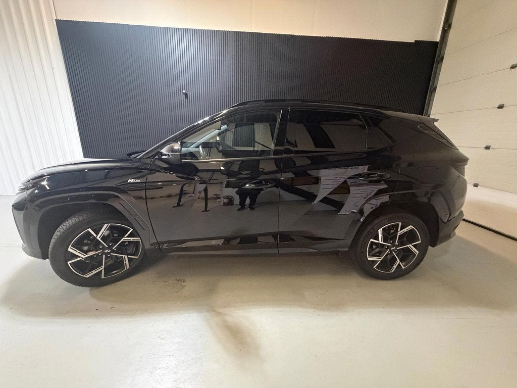 Hyundai Tucson 1.6 T-GDI HEV N Line automaat, Auto's, Hyundai, Gebruikt, Zwart, 4 cilinders, Adaptive Cruise Control