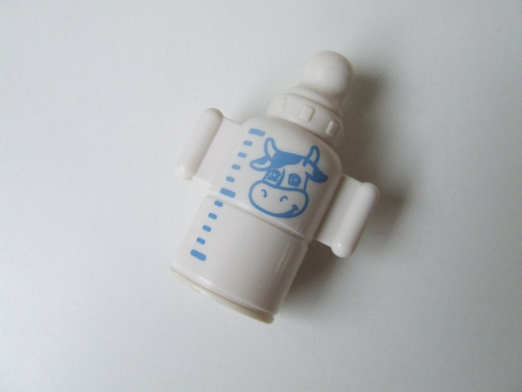 Witte Duplo babyfles met schubben, Ophalen of Verzenden, Gebruikt, Accessoire, Duplo