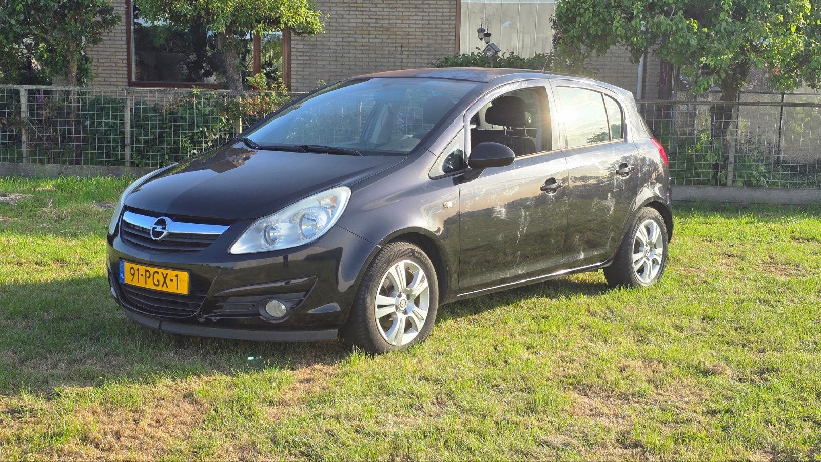 Opel Corsa 1.2 16V 5D 2010 Zwart / NWE APK / CLIMA / NAP / 5, Voorwielaandrijving, Euro 6, 4 cilinders, 1229 cc