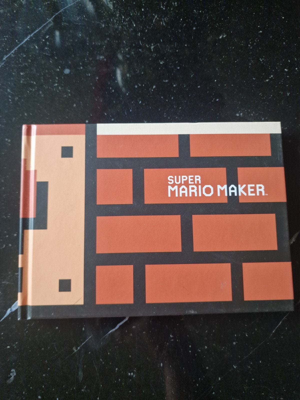 Super Mario Maker Artbook / Handleiding (NL), Boeken, Ophalen of Verzenden, Zo goed als nieuw, Nintendo
