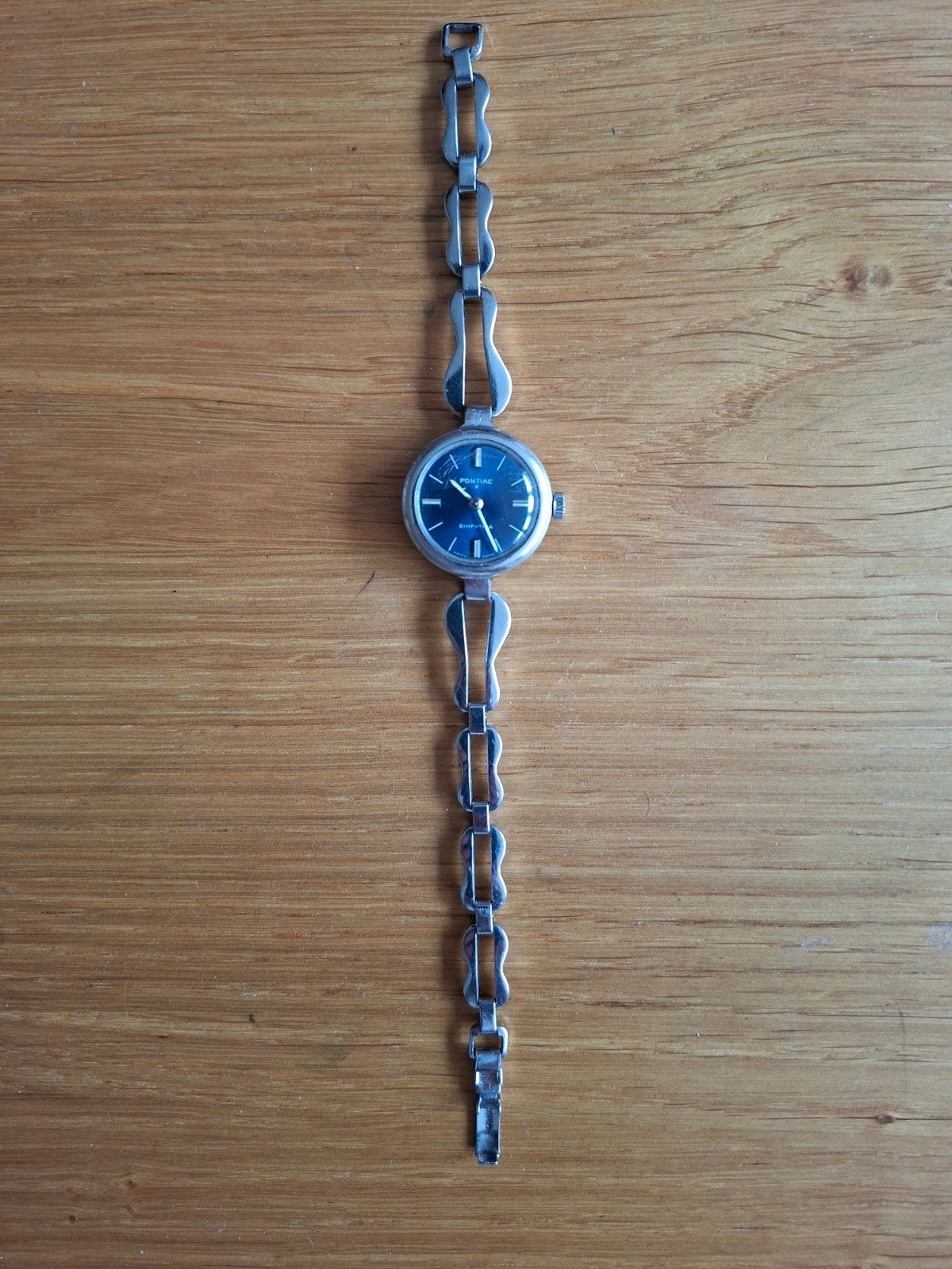 Vintage Pontiac horloge met metalen band, handopwindbaar, Ophalen of Verzenden, Staal, Overige merken, 1960 of later