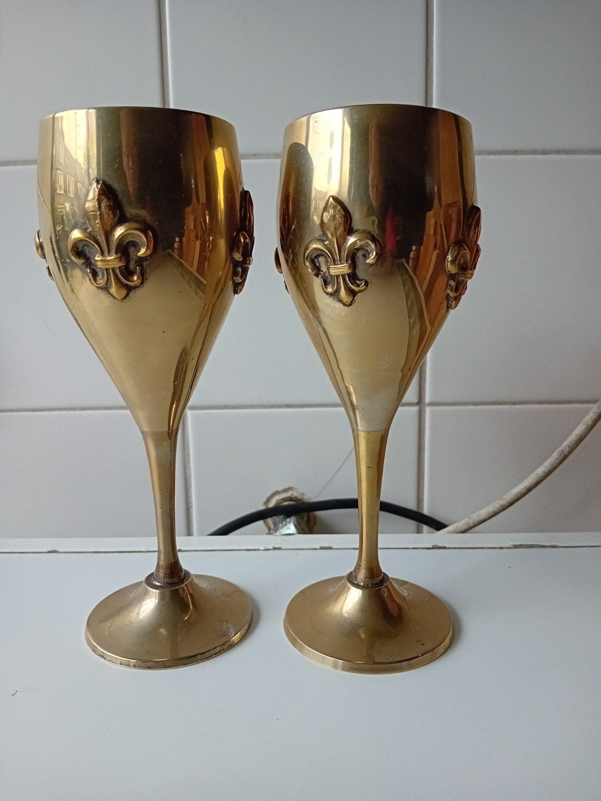 Set van 2 messing kelken met Fleur-de-lis decoratie, Ophalen of Verzenden