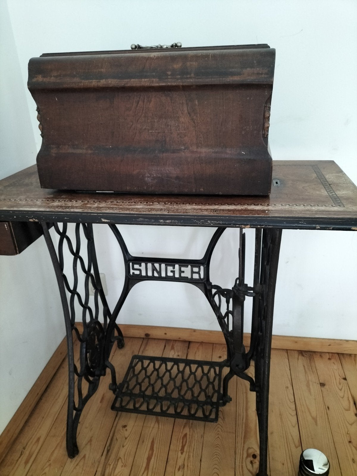 Antieke Singer Naaimachine, Ophalen