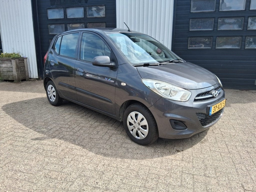 Hyundai i10 1.0 i-Drive Airco / Cool cruise controle, Auto's, Euro 5, Gebruikt, 31 €/maand, 400 kg