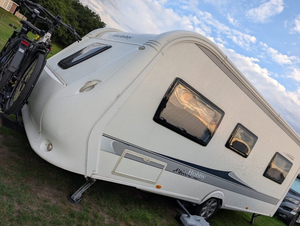2012 Hobby 560, Caravans en Kamperen, Ringverwarming, Rondzit, Hobby, 6 tot 7 meter