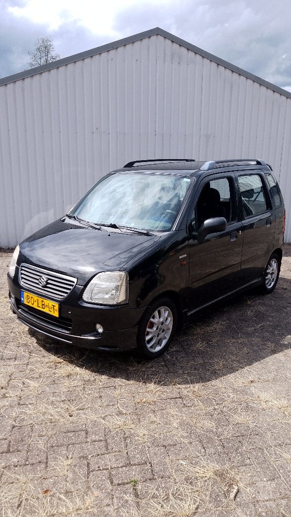 Suzuki Wagon R+ 1.3 2002 Zwart - moet snel weg, Voorwielaandrijving, 31 €/maand, 4 cilinders, Origineel Nederlands