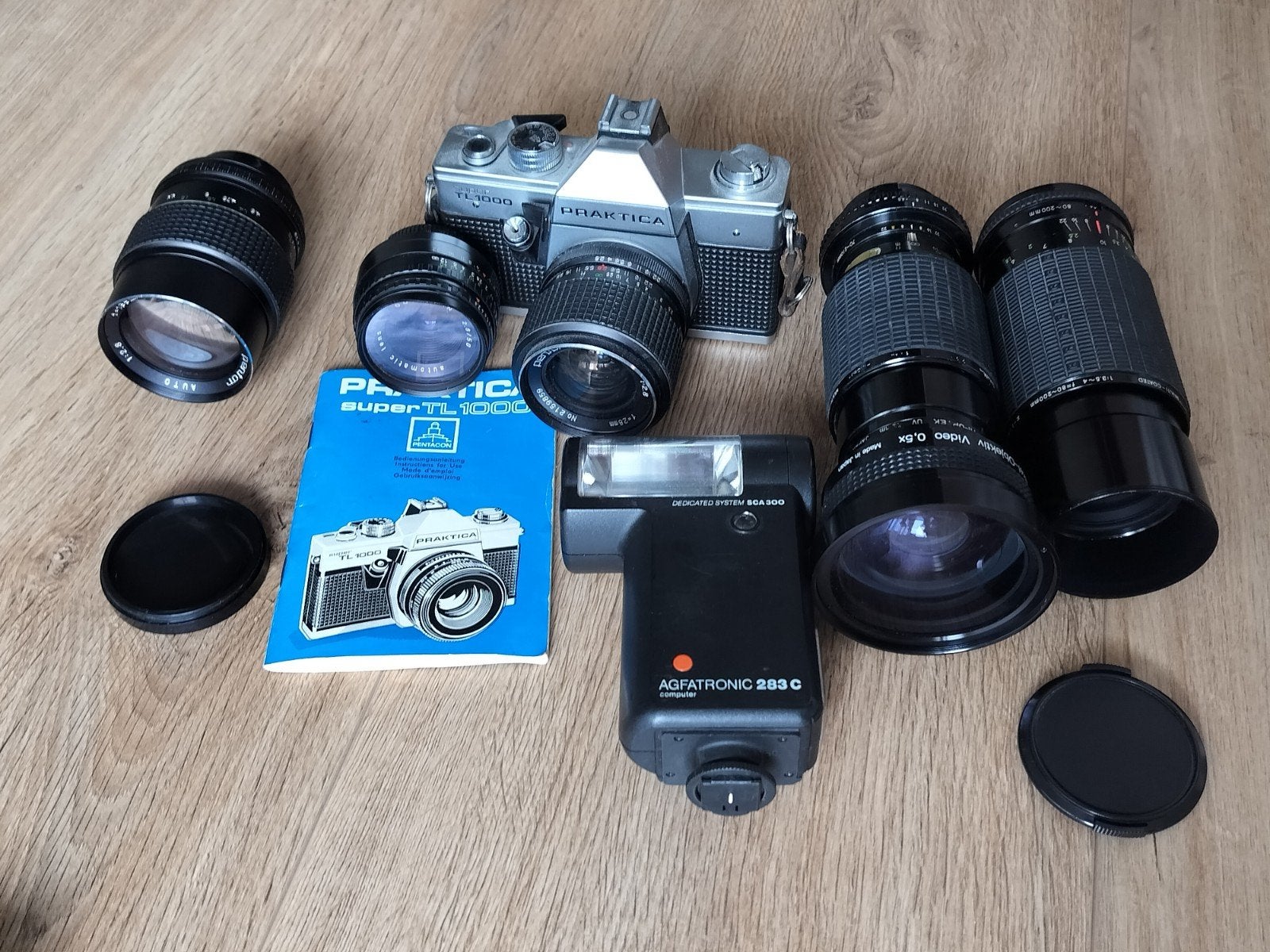 Praktica TL1000 Spiegelreflexcamera met 4 lenzen, Ophalen of Verzenden, Gebruikt, Spiegelreflex, Overige Merken