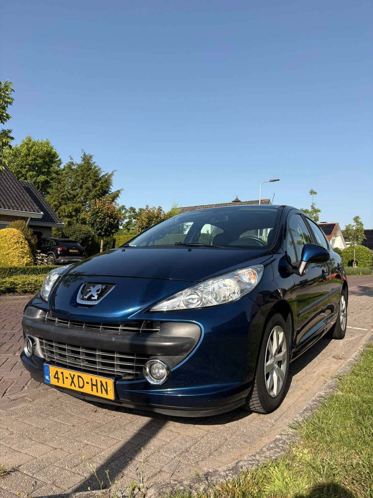 Peugeot 207 1.4 16V 5DRS 2007 Blauw, Auto's, Voorwielaandrijving, Stof, 1360 cc, Zwart