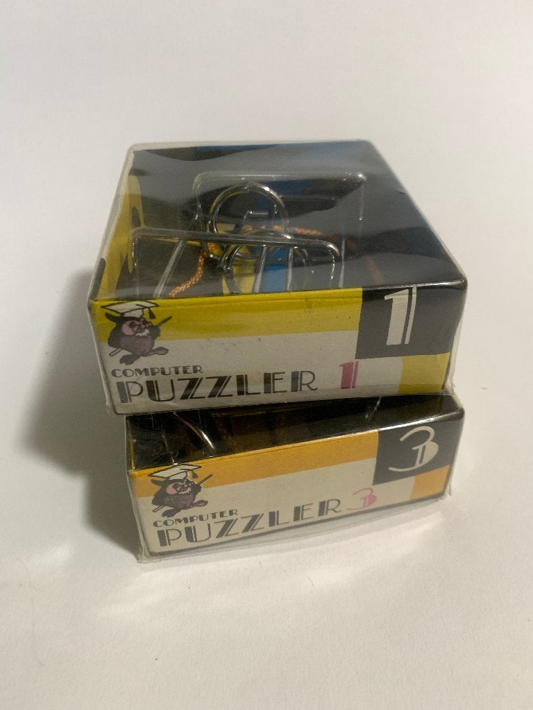 2 Puzzels Puzzler 1 en 3 - metalen vorm, ringen en koord, Ophalen of Verzenden, Minder dan 500 stukjes, Nieuw, Rubik's of 3D-puzzel