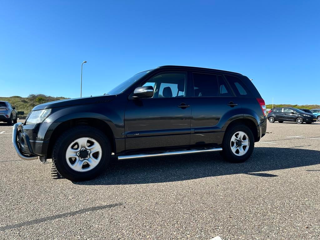 Suzuki Grand Vitara 2.4 5D 2009 Zwart, Auto's, Suzuki, Particulier, Grand Vitara, 4x4, Achteruitrijcamera, Adaptive Cruise Control