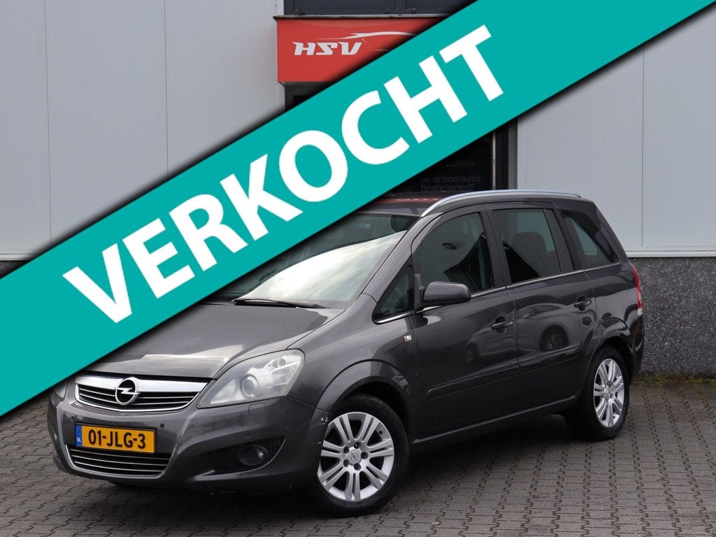 Opel Zafira 1.8 Cosmo 7-pers navi 1/2 Leer airco org NL, Auto's, Opel, Gebruikt, 4 cilinders, Zafira, Zilver of Grijs