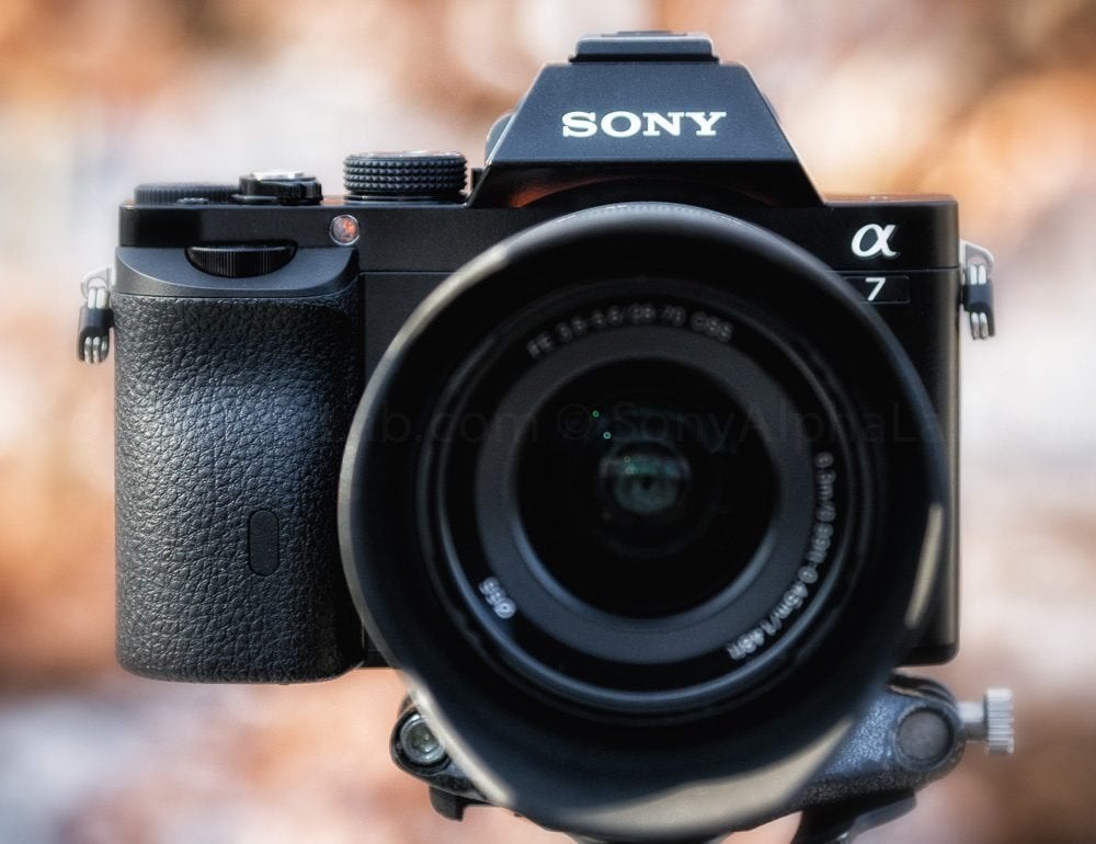 Sony A7 Mk1 incl. 28-70mm. OSS en VG-C1EM (nieuwstaat), Spiegelreflex, Ophalen of Verzenden, Zo goed als nieuw, Sony