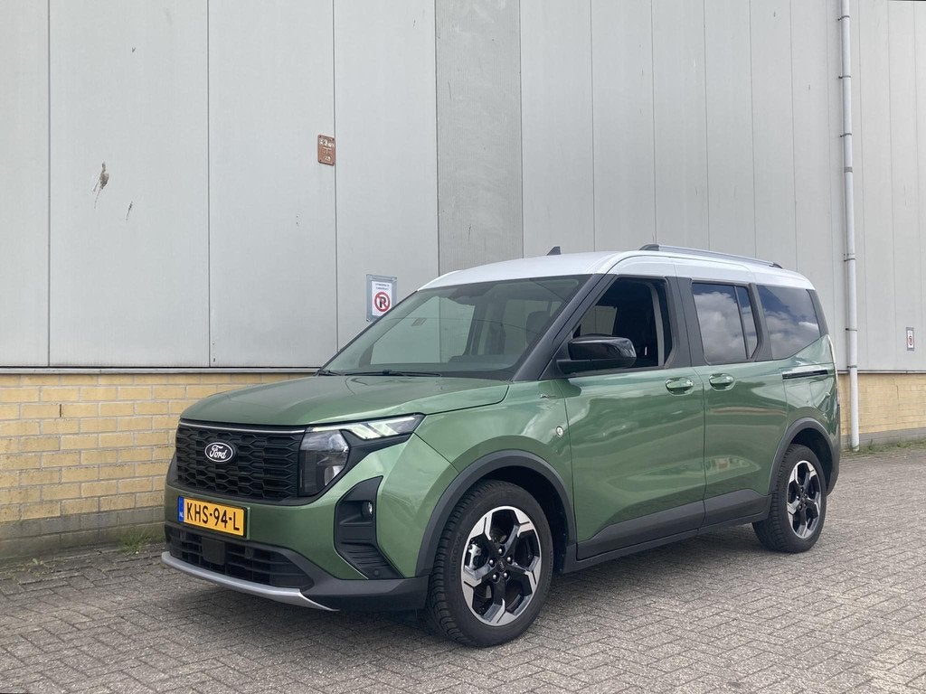 Ford Tourneo Courier Active 1.0 Ecoboost 125 pk Automaat Uni, Auto's, Ford, Gebruikt, Zwart, 14 km/l, Bedrijf