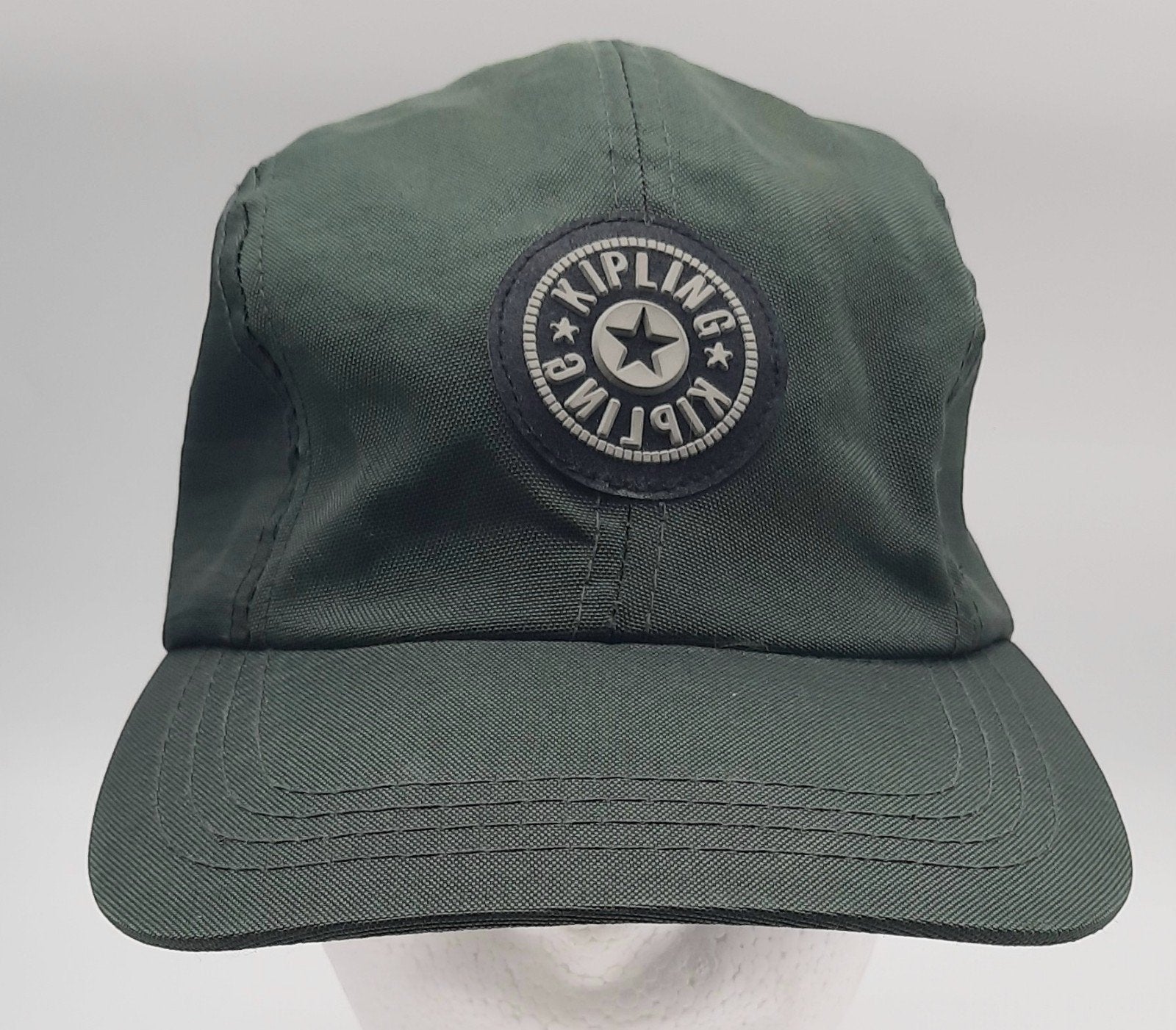 Groene Kipling pet / cap, Verzamelen, Ophalen of Verzenden, Zo goed als nieuw, Overige typen