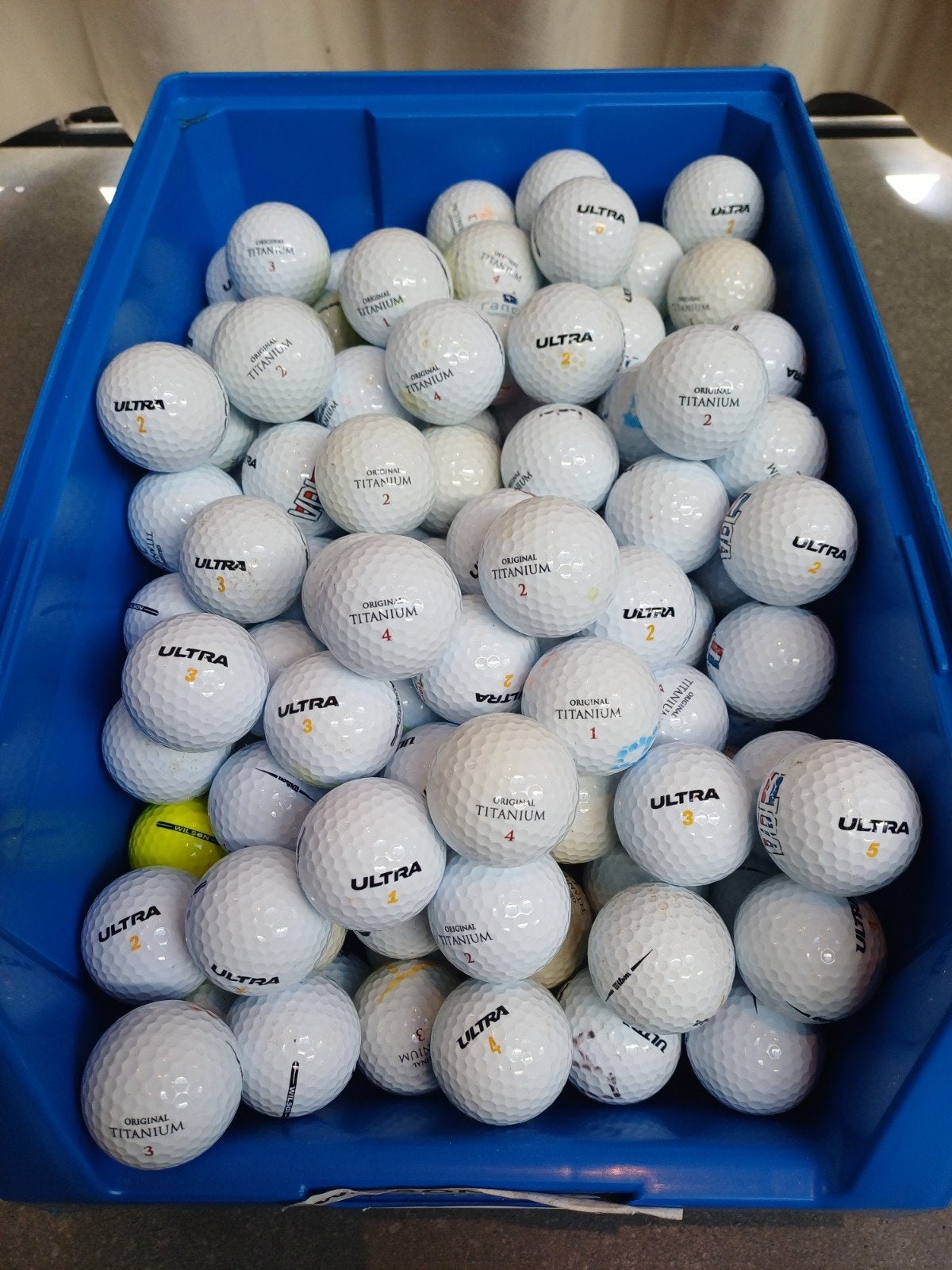Wilson Titanium & Ultra golfballen - Topkwaliteit, Sport en Fitness, Golf, Ophalen, Zo goed als nieuw, Bal(len), Overige merken