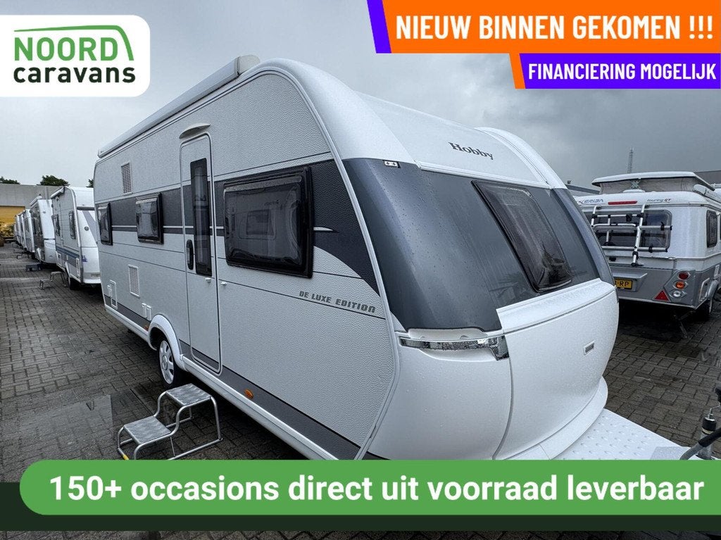 Hobby 545 KMF DE LUXE ED.,STAPELBED,DWARSBED,VOORTENT,AIRCO, Caravans en Kamperen, Caravans, Hordeur, Hobby, 7 tot 8 meter, Bedrijf